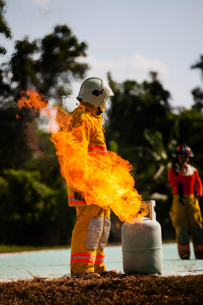 Firefighter with fire and suit for protect fire fighter for trai